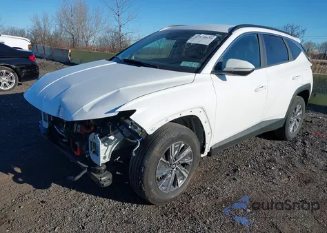2022 Hyundai Tucson Hybrid Blue from USA, damaged, VIN KM8JBCA19NU030942